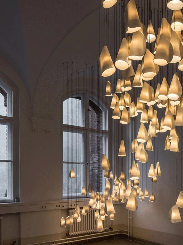 

Nordic Minimalist ceramics chandelier Canada design artistic creativity pendant lamp Villa staircase living room long lights