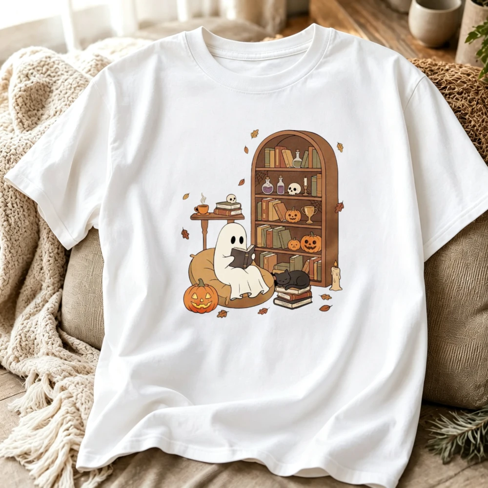 Cozy Book Lover Ghost Halloween T‑Shirt Cute Ghost Reading on Bean Bag Witchy Bookshelf Pumpkin Black Cat Potion Bottle Tops Tee
