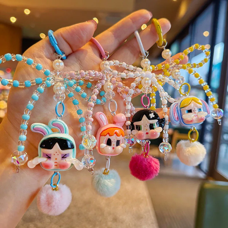 

Cartoon crying wow soft and cute hairball little girl keychain creative cute little flower plush ball couple bag gift pendant