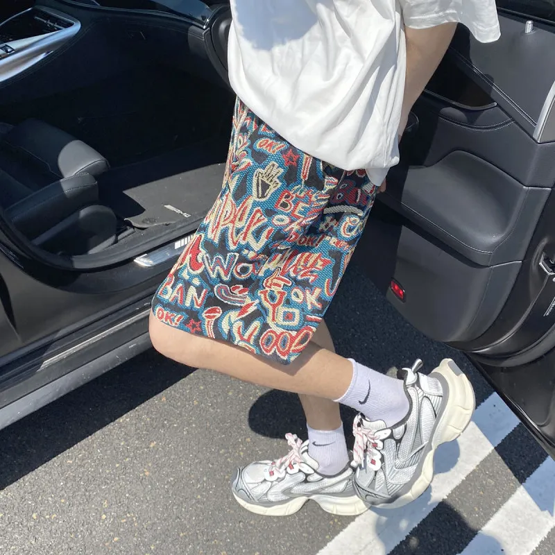 

Повседневная мужская летняя пляжная обувь с этническим отрывом и пятиточечным узором, свободная посадка с высокой талией, молодежная прохладная прямая брюка...