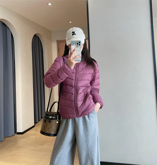 Giacca imbottita leggera da donna stile corto outdoor casual 90% piumino d'anatra bianca stile gilet tessuto in nylon chiusura con cerniera con cappuccio