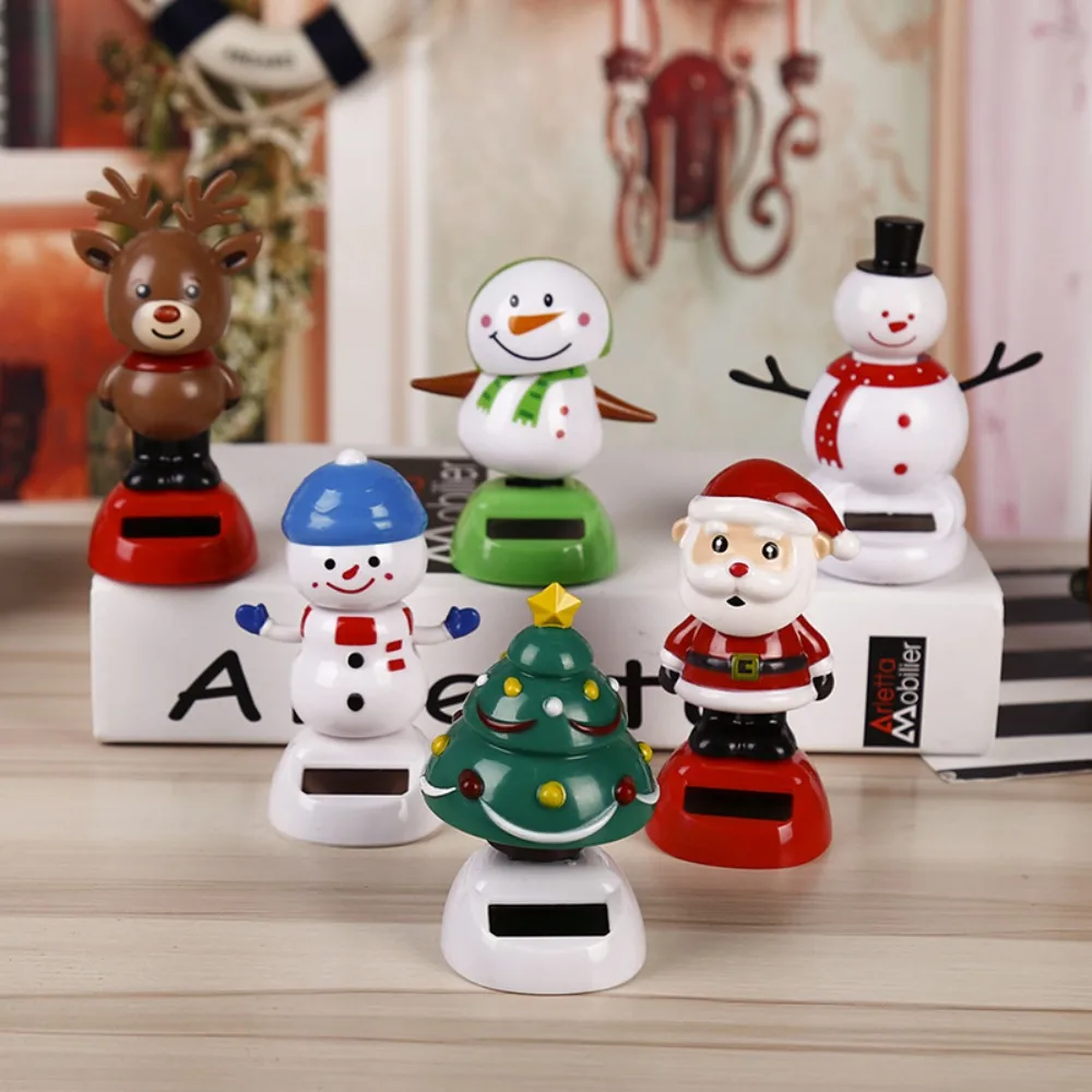 

Christmas Solar Dancing Toys Cute Shaking Head Doll Elk Santa Snowman Penguin Swing Figurines For Home Office Car Window Decors