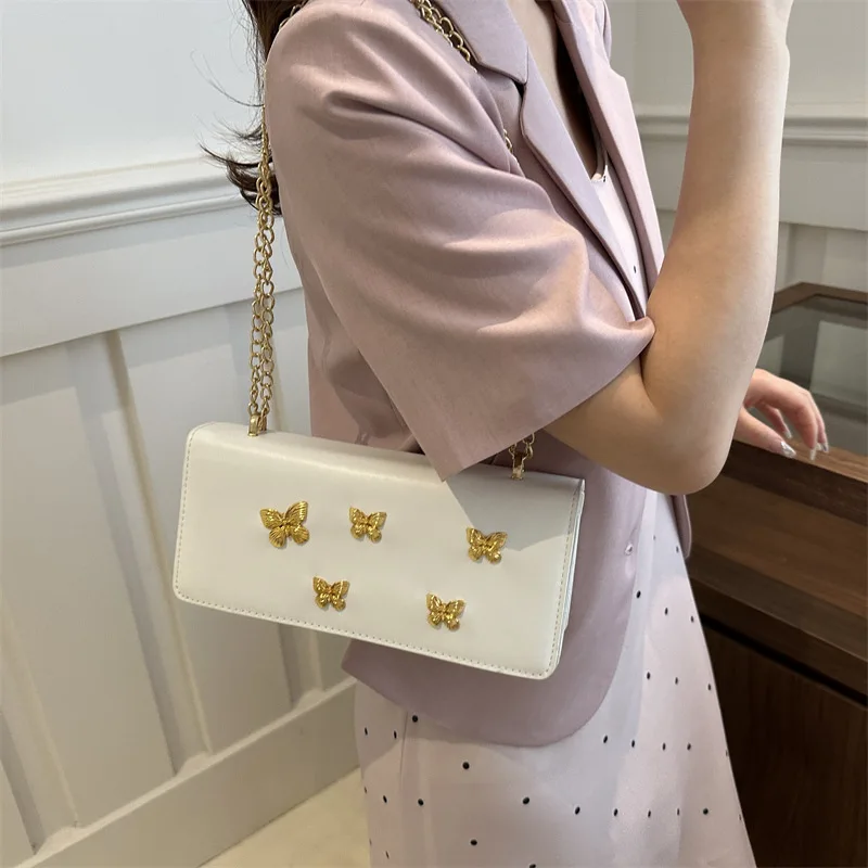 2024 New Fashion Shoulder Slant French Small Square Women's Bag Forest Style Leisure Chain Rivet Butterfly Shoulder Bag