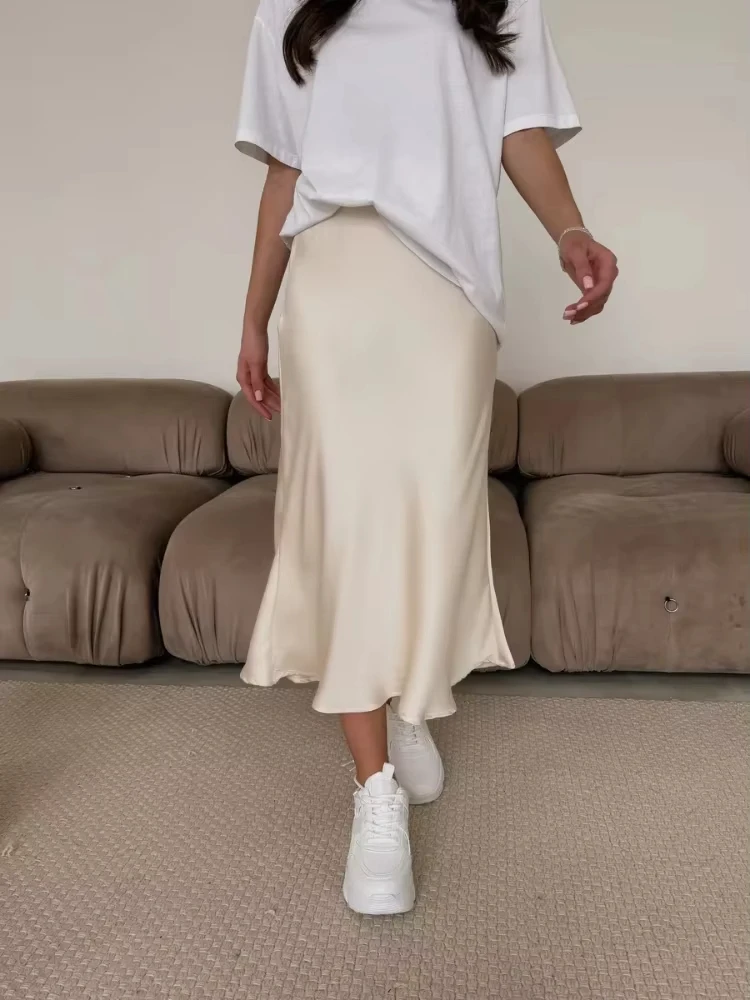 黒人女性のスカートファッション気質エレガントロングスカート2025秋新作シンプル快適シャンパン色伸縮性ハイウエストスカート