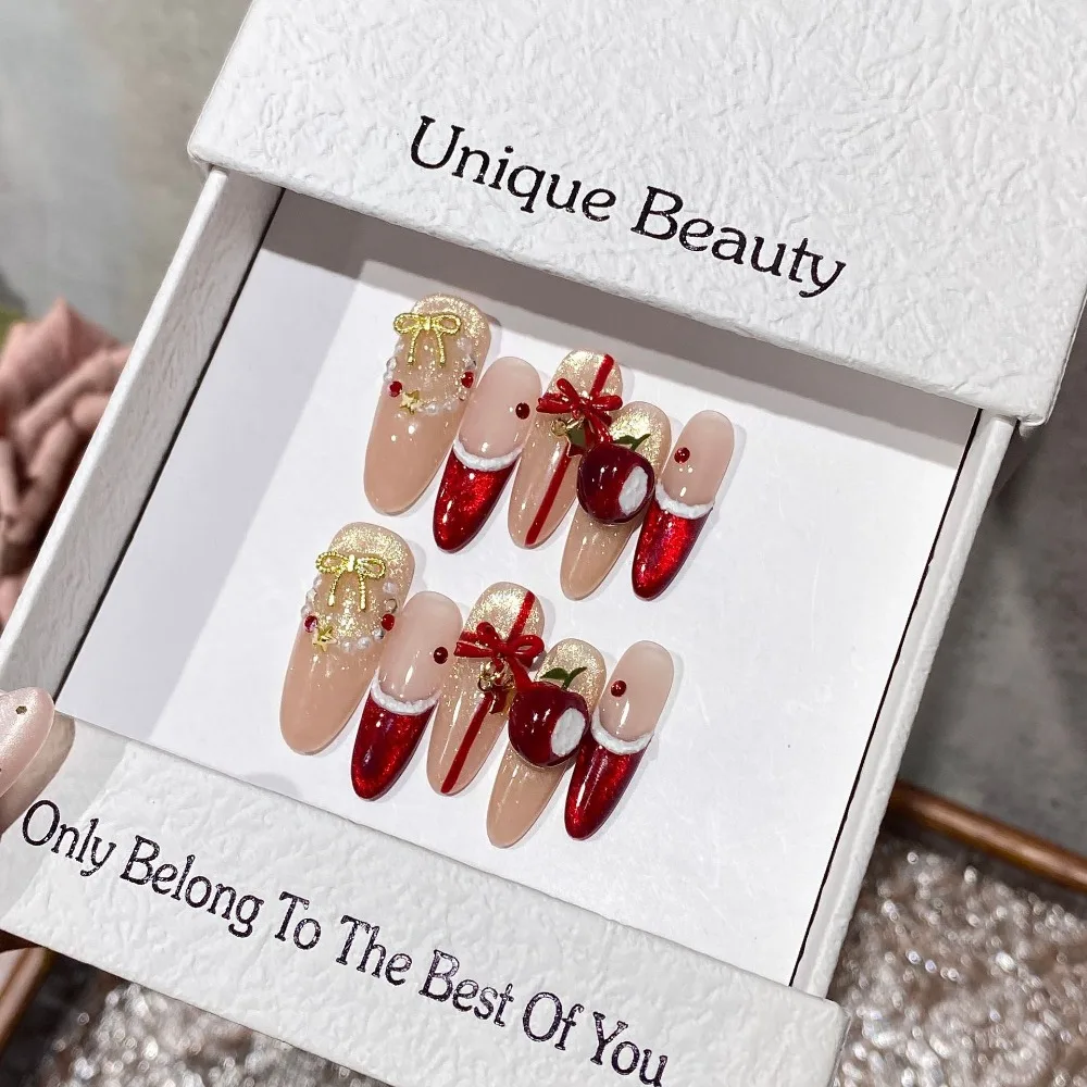 10 pezzi autunno inverno regali di Natale stampa fatta a mano sulle unghie fiocco dorato 3D mela rossa occhio di gatto unghie finte rimovibili riutilizzabili