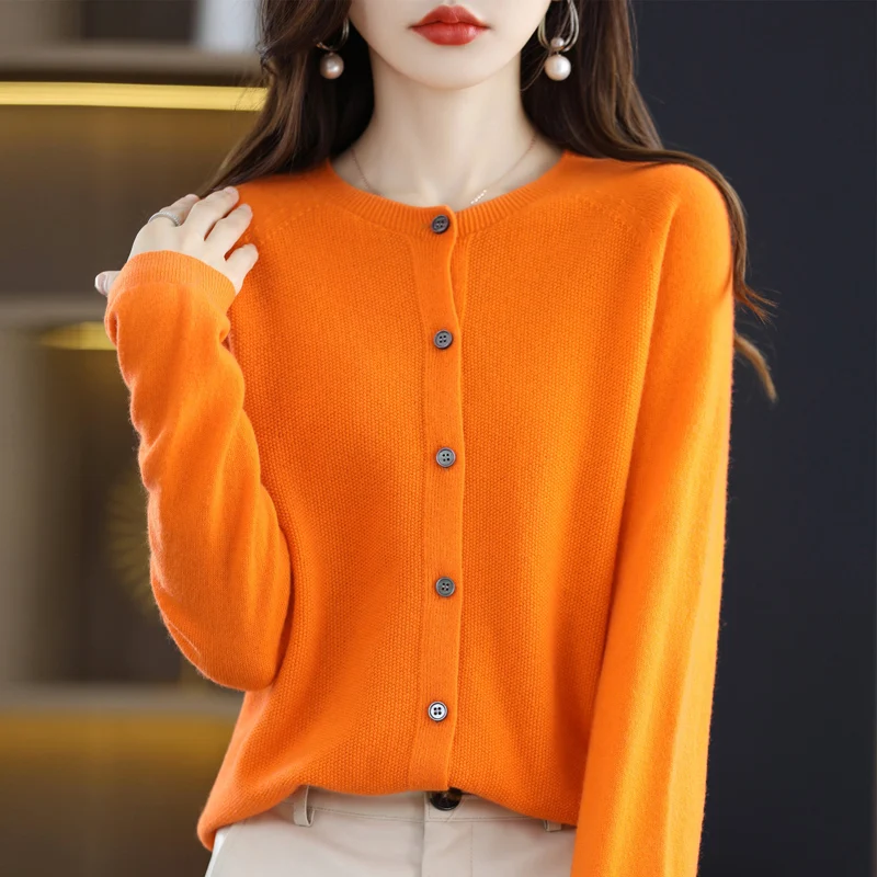 Autumn and winter new Merino 100% wool solid color warm female O-neck knitted long sleeve solid color cardigan