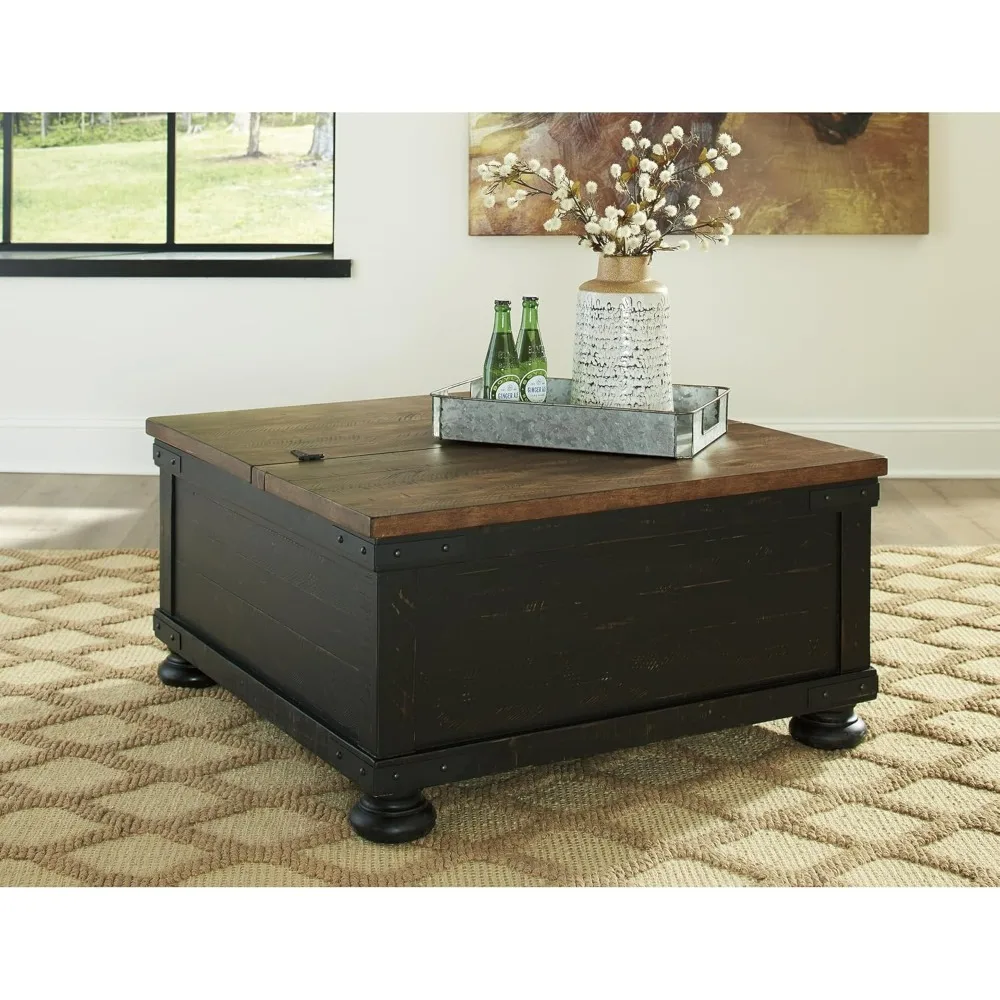 The iconic design of the farmhouse's raised desktop coffee table with storage space, featuring antique brown and black finishes