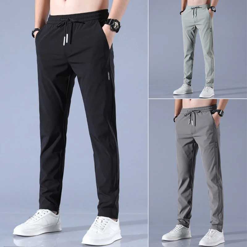 

Trousers Men Summer Korean Version of the Large Size Slim Straight Casual Trousers Thin Section Sports Elastic Tyouth Rousers