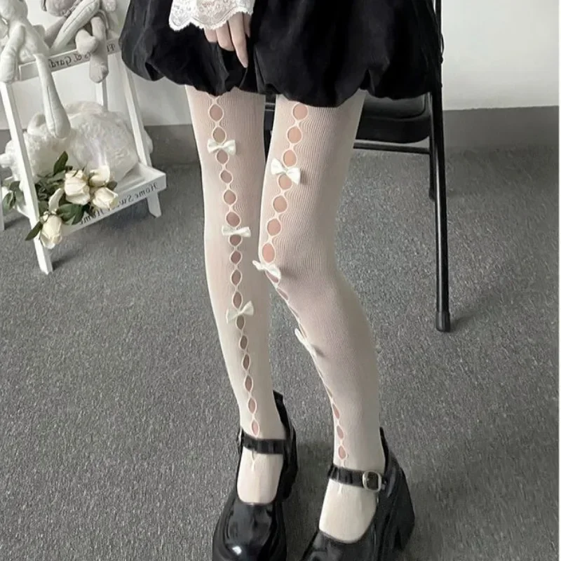 Lolita cosplay meninas bowknot oco para fora meia-calça sexy fina ins maré rendas meias anime preto branco fishnet meias de seda