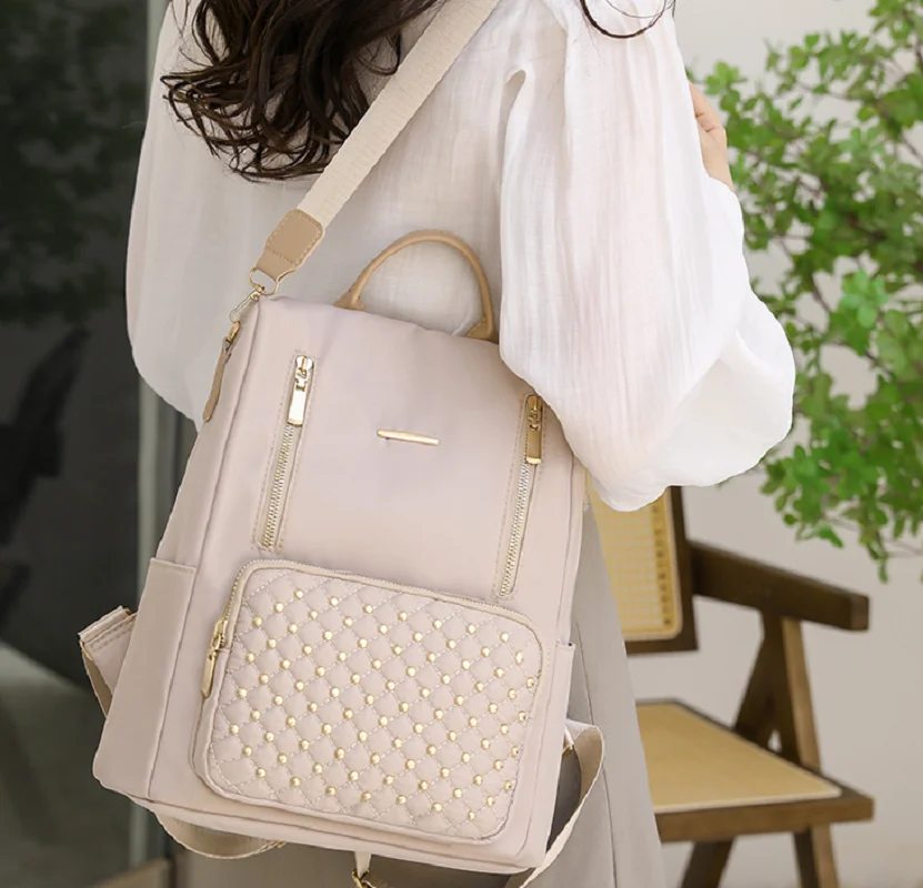 Korean Fashion Rivet Large Capacity Waterproof Nylon Backpack Women Anti Theft Travel Double Shoulder Bags Notebook School Bags