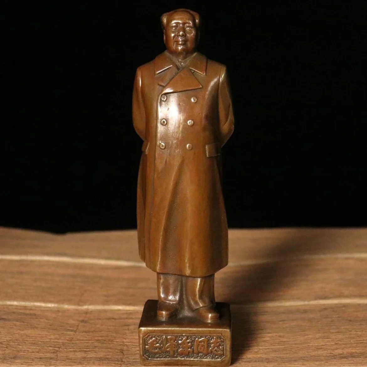 

Brass statue of Chairman Mao is like bronze statue great man. Old bronze statue home office