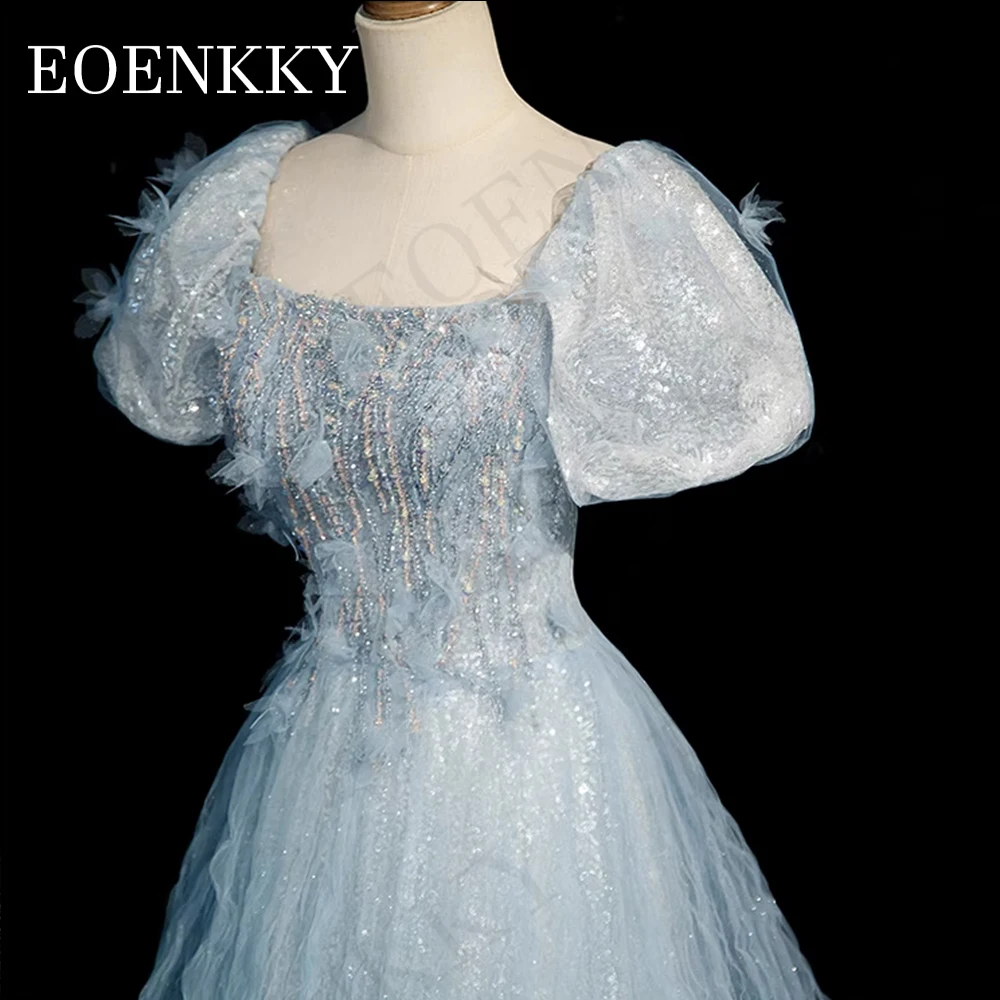 Niebieski brokat Cekiny Luksusowe sukienki na studniówkę Kobiety 2024 A Line Beaded Puff Sleeves Sparkly Graduation Dress Niebieskie błyszczące cekinowe luksusowe sukienki na studniówkę dla kobiet 2024  Błyszcząca suki