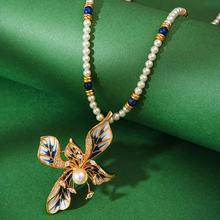 

New in Medieval Fashion High-end Enamel Glaze Iris Flower Glass White Pearl Strand Long Necklace Pendant Beaded Brooch for Women