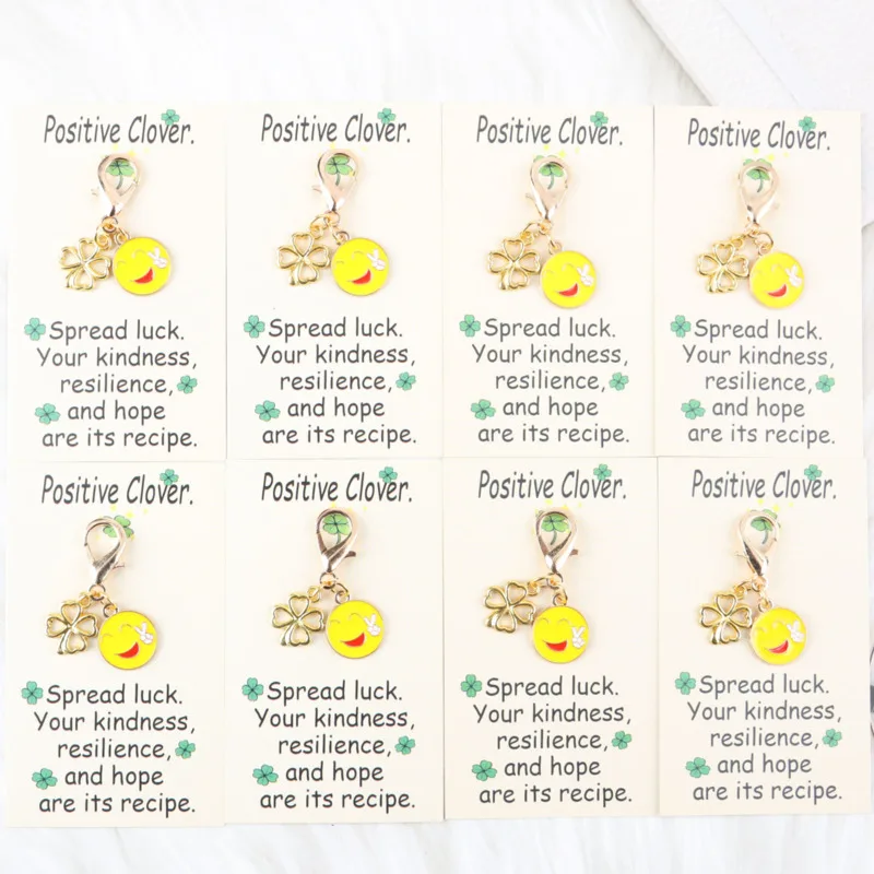 4/8pcs Cute smiling face paired with a four-leaf clover keychain set Card with a positive four-leaf clover  Actively support gif