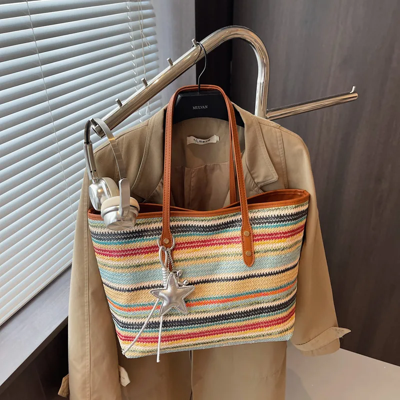 Rainbow-colored straw shoulder bag for women, suitable for beach vacations, spacious woven bucket tote