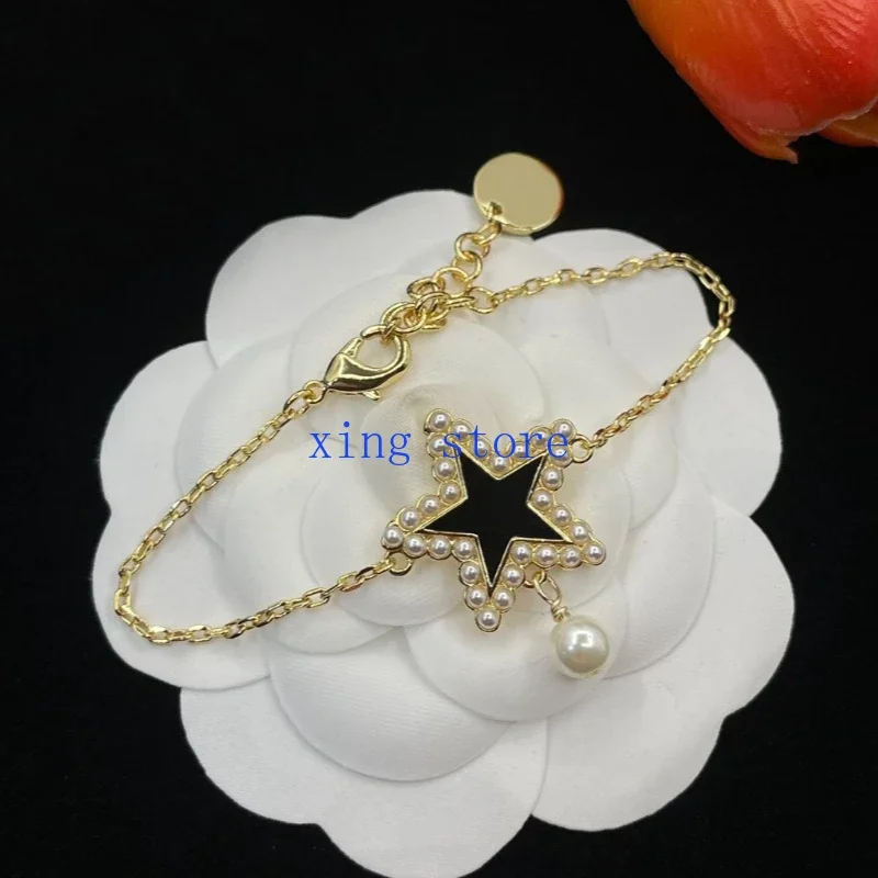 

2025 Fashion New Sweet Romantic Style Simulation Pearl Inlaid Star Pendant Women's Bracelet Necklace Set