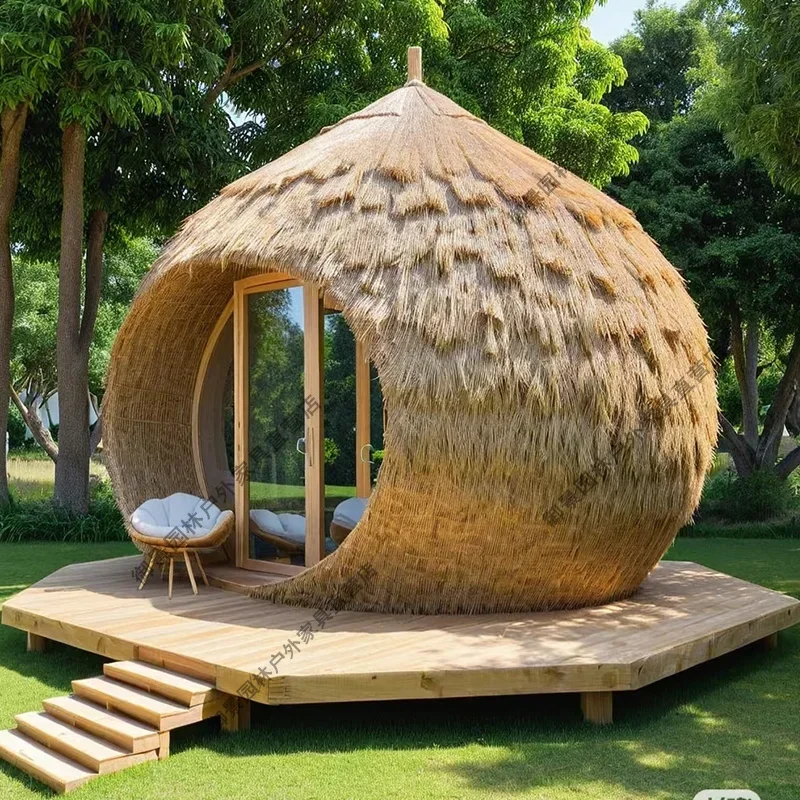 A Rattan house holiday wind clock in the photo thatched house B & B landscape room seaside creative cottage
