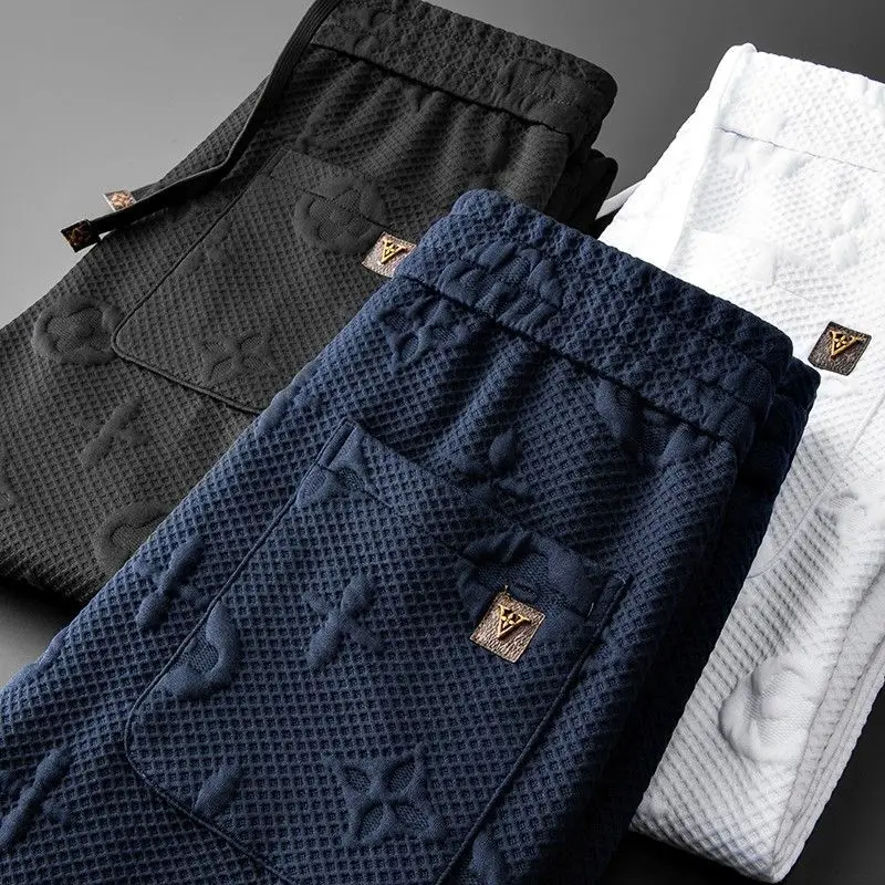 

3D three-dimensional jacquard fashion trend men's slim-fit sports knitted sweatpants casual pants