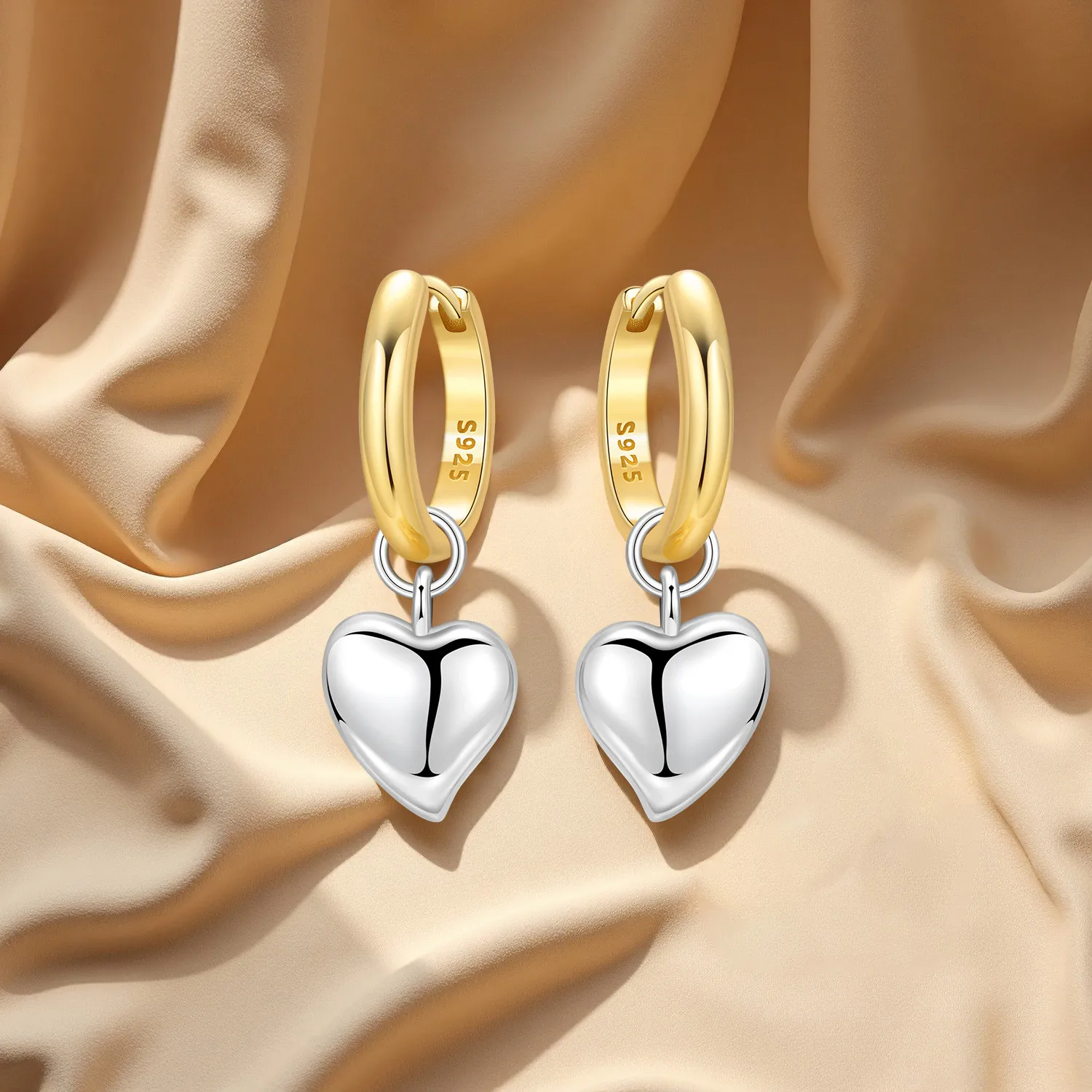 Elegant heart earrings for women featuring gold and silver heart-shaped designs, perfect for gifting and everyday fashion from VelmoraMart.