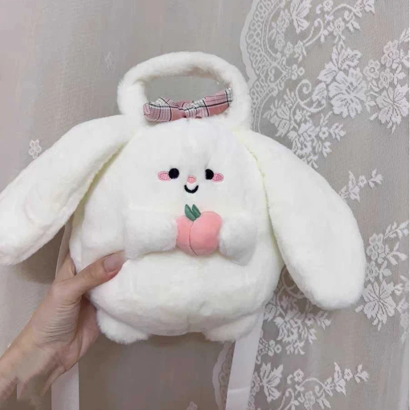 Nuova vendita calda avocado peluche bambola borsa gatto bambola cuore della ragazza borsa a croce diagonale morbida e carina bambola curativa piccolo regalo