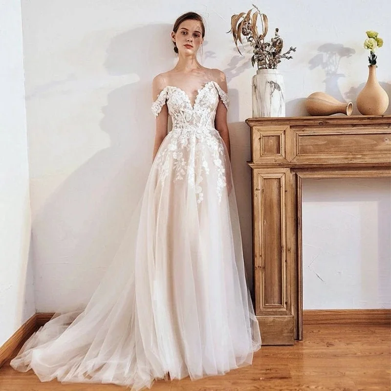 

Stunning Robe De Mariee 2025 Morden A Line Beach Wedding Gowns Off the Shoulder Appliques Tulle Sweep Train Boho Bohemian gown