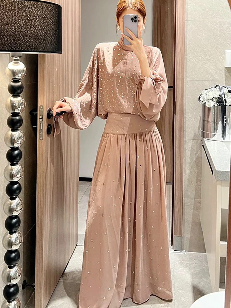 

2025 elegant temperament women's suit autumn new hot drilling long-sleeved pullover top +A-shaped skirt fashion two-piece suit