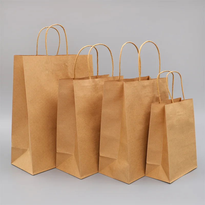 10/25/50 unids/lote bolsa de papel Kraft con asas bolsas de embalaje de regalo para tienda de ropa boda suministros de Navidad Kit de bolsos