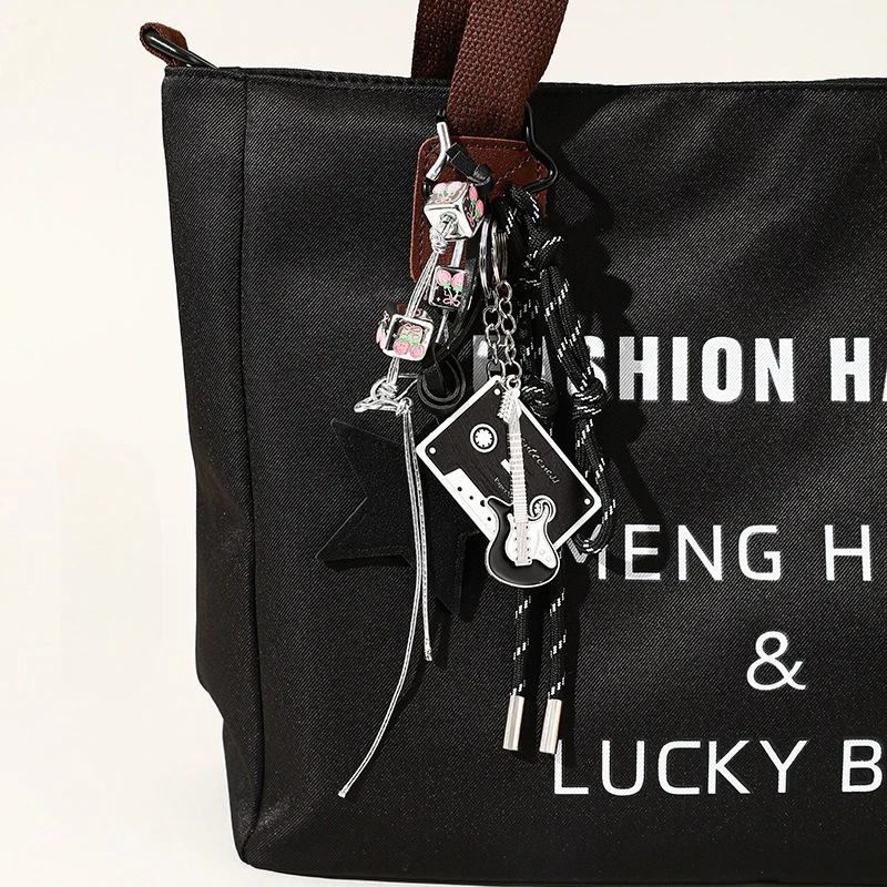 handwoven-bag-charm-ornament-chain-cute-guitar-keychain-for-women-high-end-backpack-pendant