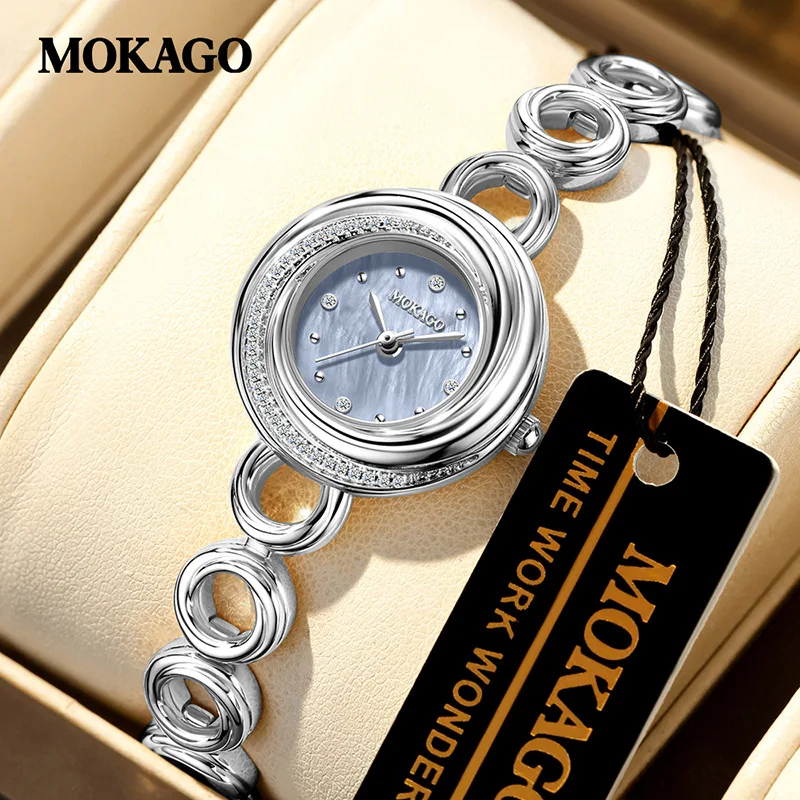 Orologio da donna al quarzo di lusso impermeabile quadrante in madreperla braccialetto stella diamante cinturino in rame orologio da polso elegante e versatile