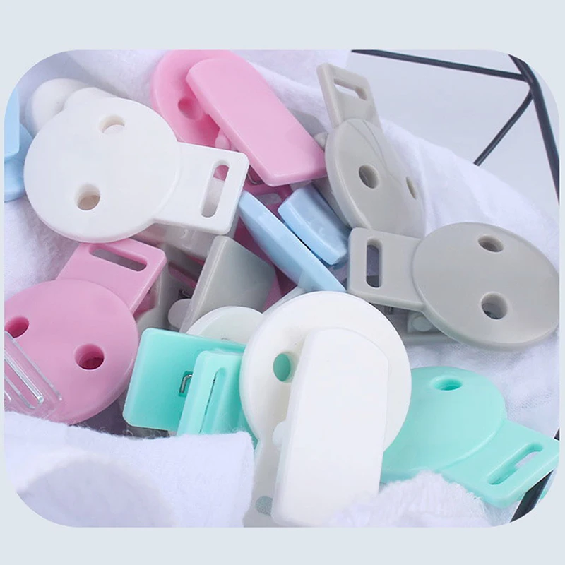 5Pcs Clip per ciuccio per bambini Clip per ciuccio in plastica solida supporto per succhietto supporto per capezzoli per neonati accessori per catena per massaggiagengive fai da te giocattolo per bambini