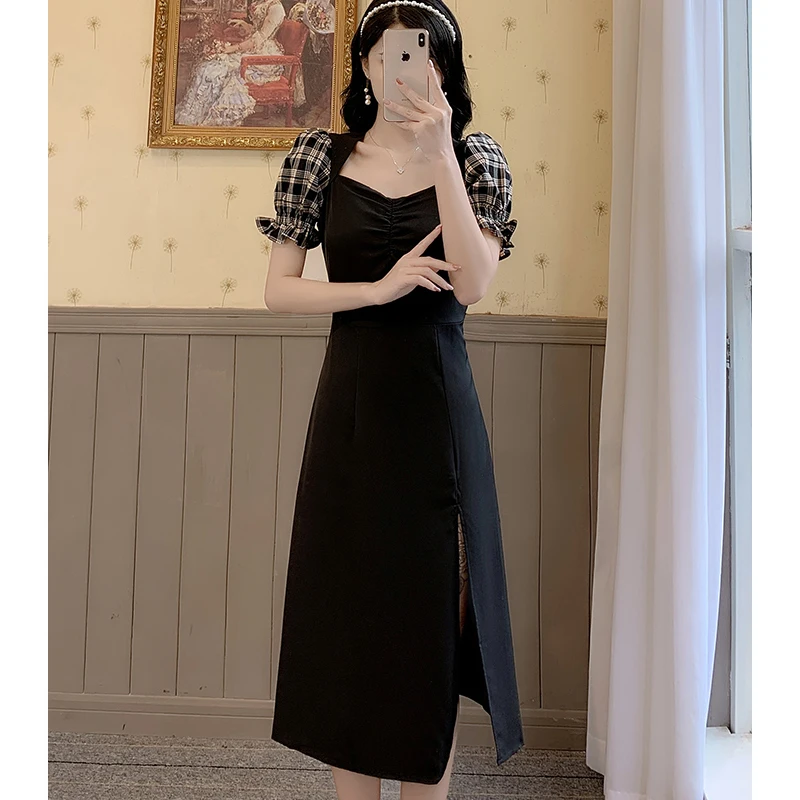 

2022 Women's French Retro Slim Temperament Stitching Black Dress High-quality Elegant Slit Stitching Puff Sleeve Dress