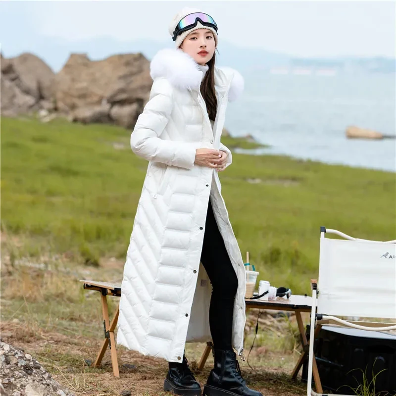 High-end Design Sense Niche White Eiderdown Down  Female 2023 New Long Pure White Big Fur Collar Hooded Warm Thick Coat.