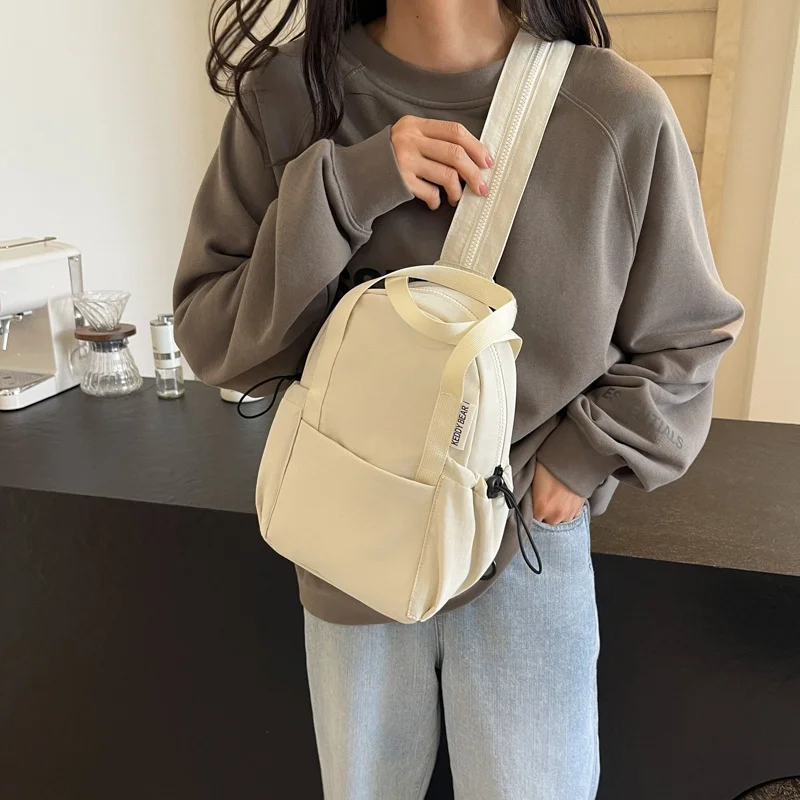 nova-mochila-multifuncional-para-homens-e-mulheres-2024-leve-bolsa-de-ombro-transversal-em-material-de-nylon