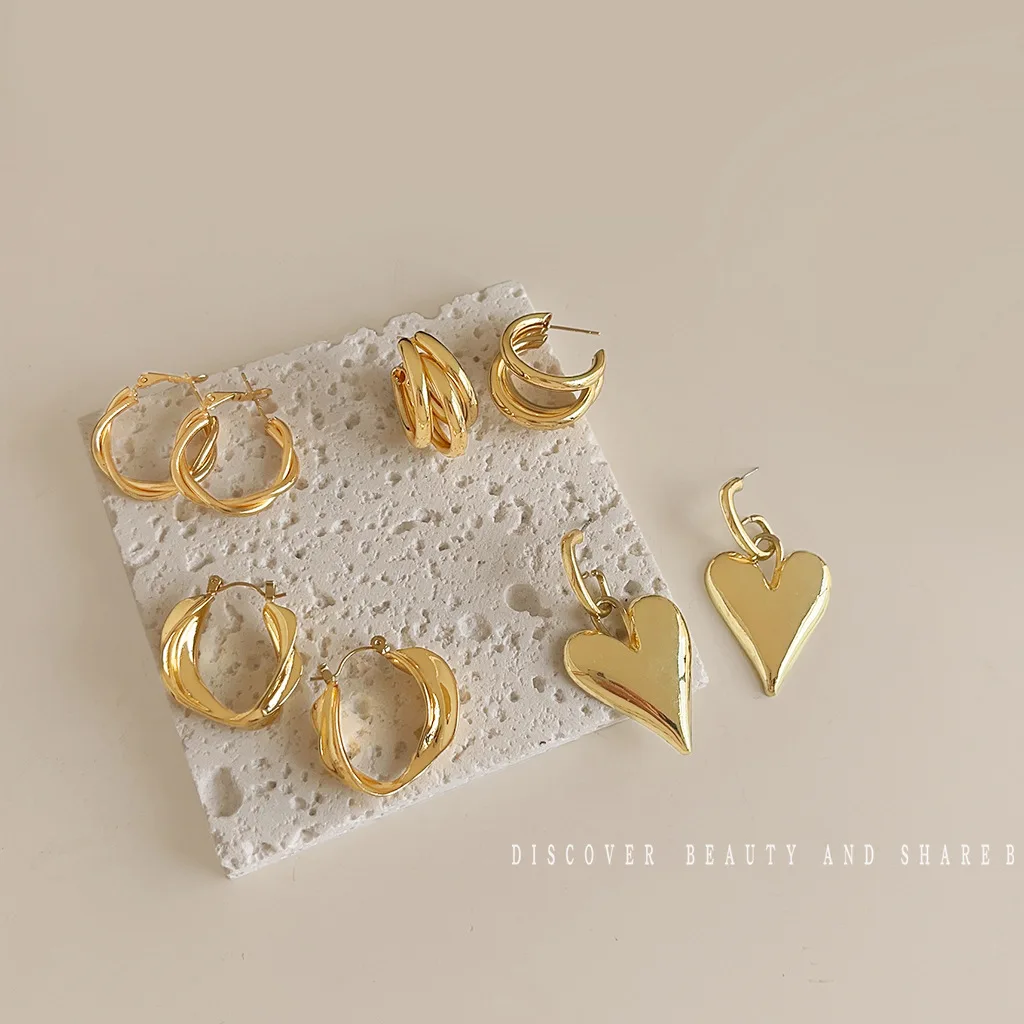 DIY accessories High sense irregular metal earrings fashionable temperament love studs niche light luxury fashion versatile earr