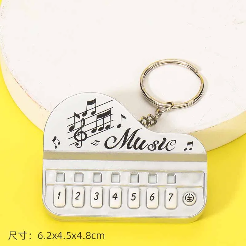 Creative Light-emitting Keychain Toy Simulation Piano Player Music Master Mini Kids Electronic Piano Electronic Game Machine Toy