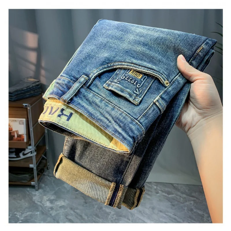 High-End and Fashionable Jeans Men's Slim Fit Skinny 2024 Spring and Autumn New Casual Simple Hot Stamping Flower Trousers