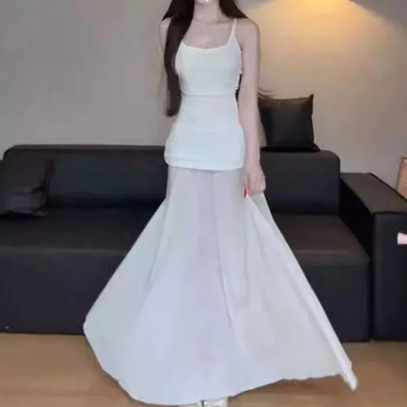 Nouvelle robe longue sexy noire pour femme, à fines bretelles, en maille transparente, coupe ajustée, idéale pour les soirées, collection 2026