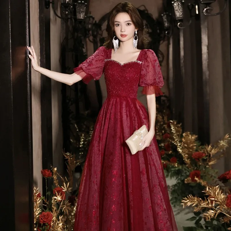 

A new and stylish casual dress in wine red for toasting