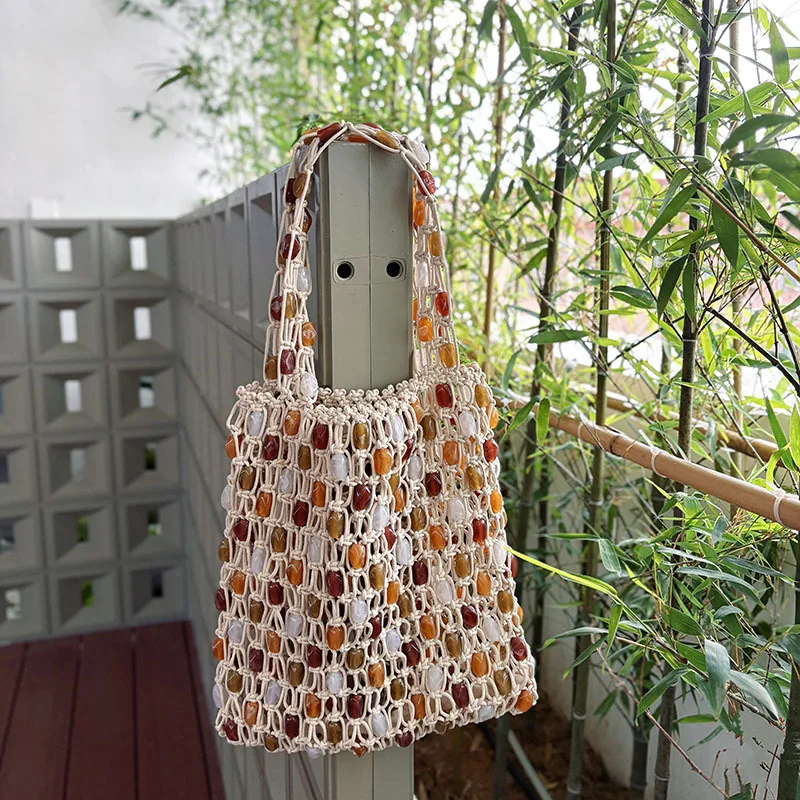 

Summer new casual beaded bag for women, fashionable high-end woven handbag with lattice hollow-out wooden beads, beach bag