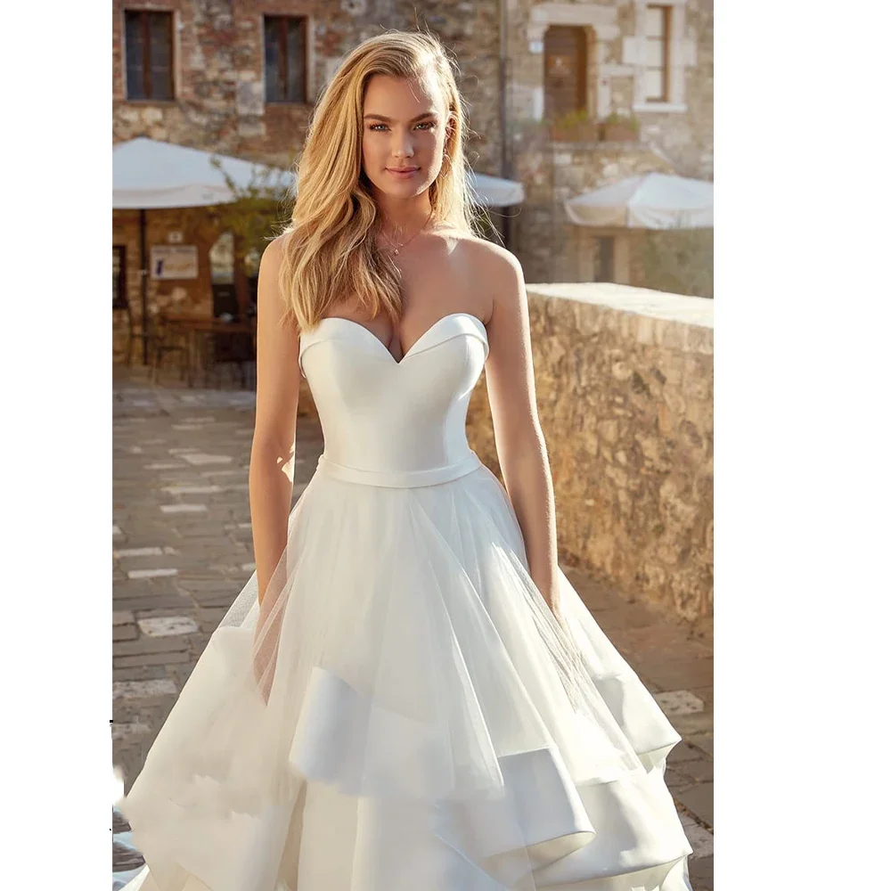 Personnalisé Simple sixyTulle à plusieurs niveaux sans manches chérie dos nu Princesines une ligne robes De mariée mariée robes De Novia