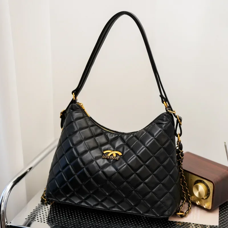 

Коллекция 2025: Женская сумка на одно плечо под мышками с ощущением дизайна. Классический ромб, простой и изысканный узор.