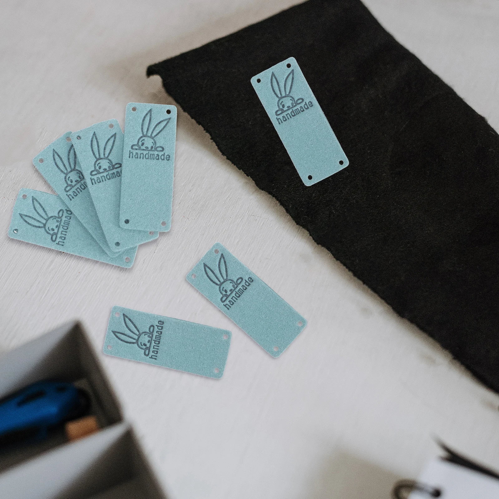 

100 Pcs Embossed Suede Tags Clothing Labels with Holes Handmade Bags Accessories DIY Sewing Projects Folder Labels