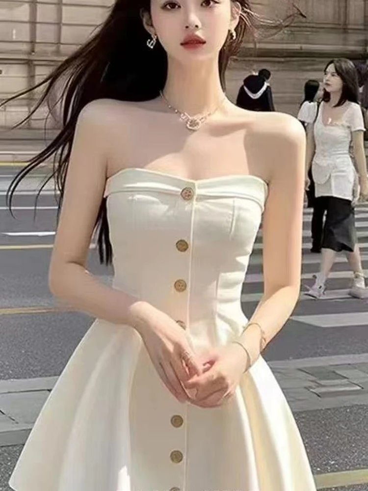 Temperamento peito única fileira botão vestido feminino 2025 verão avançado senso de temperamento fino luz luxo sexy saia