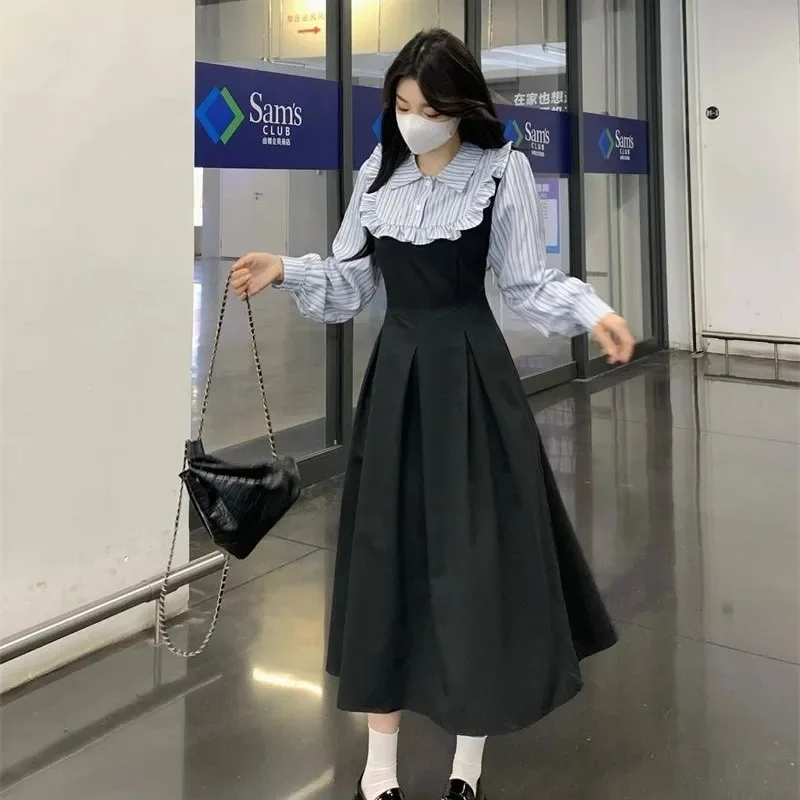 Abito camicia a righe snellente Stile falso in due pezzi Tendenza universitaria che asciuga l'età Autunno Inverno Moda internazionale transfrontaliera