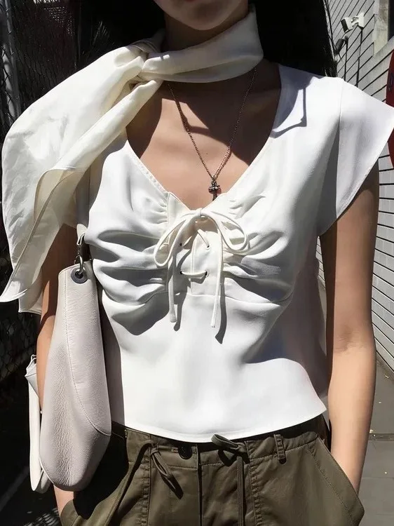 

Весенняя модная шикарная женская блузка с V-образным вырезом, коротким рукавом, подолом с оборками, узлом и эффектным дизайном, маленький размер