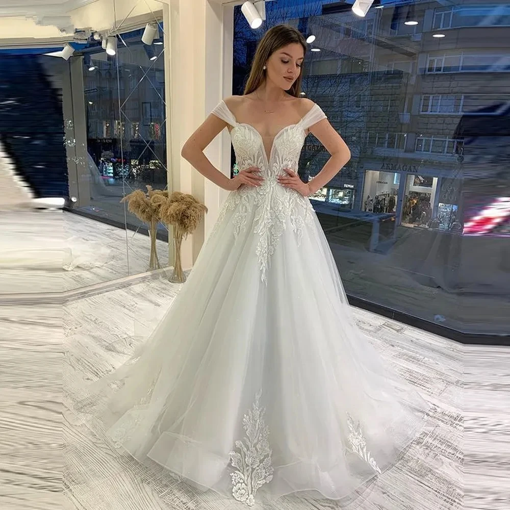 

Beautiful Elegant Wedding Dresses Deep V-neck Sleeveless A-line Lace Appliques Spaghetti Straps Train Fluffy Bridal Gown 2023