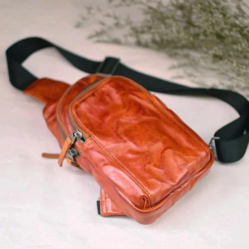 

AETOO Men's crossbody bag leather fold design simple retro zipper chest bag for household travel with a layer of soft cowhide