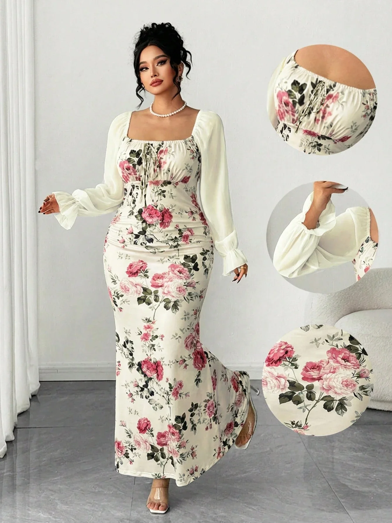 

Элегантное платье макси с цветочным принтом, квадратным воротником, пышными рукавами и бантом на талии.