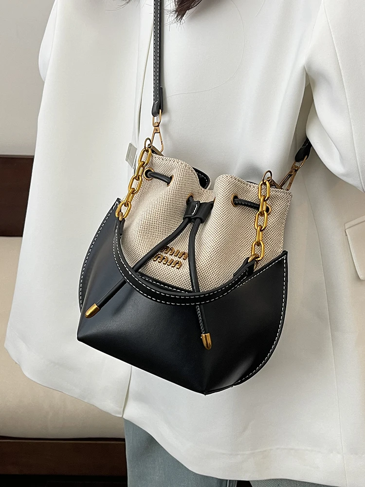 Light luxury designer commuter drawstring underarm bag bucket bag female 2025 high-end canvas chain bag shoulder messenger bag