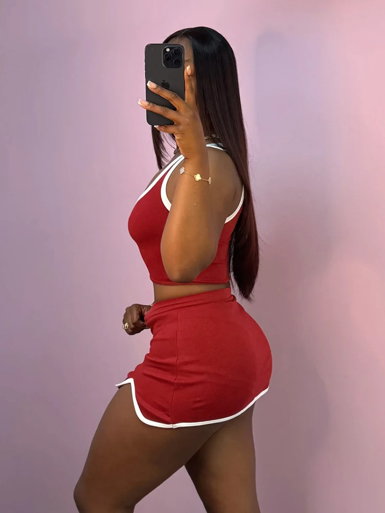 Macheda カジュアルトラックスーツ 2 点セット女性コントラストパッチワークスキニータンクトップ + 不規則な裾スカートデイリーファッションスポーティな衣装